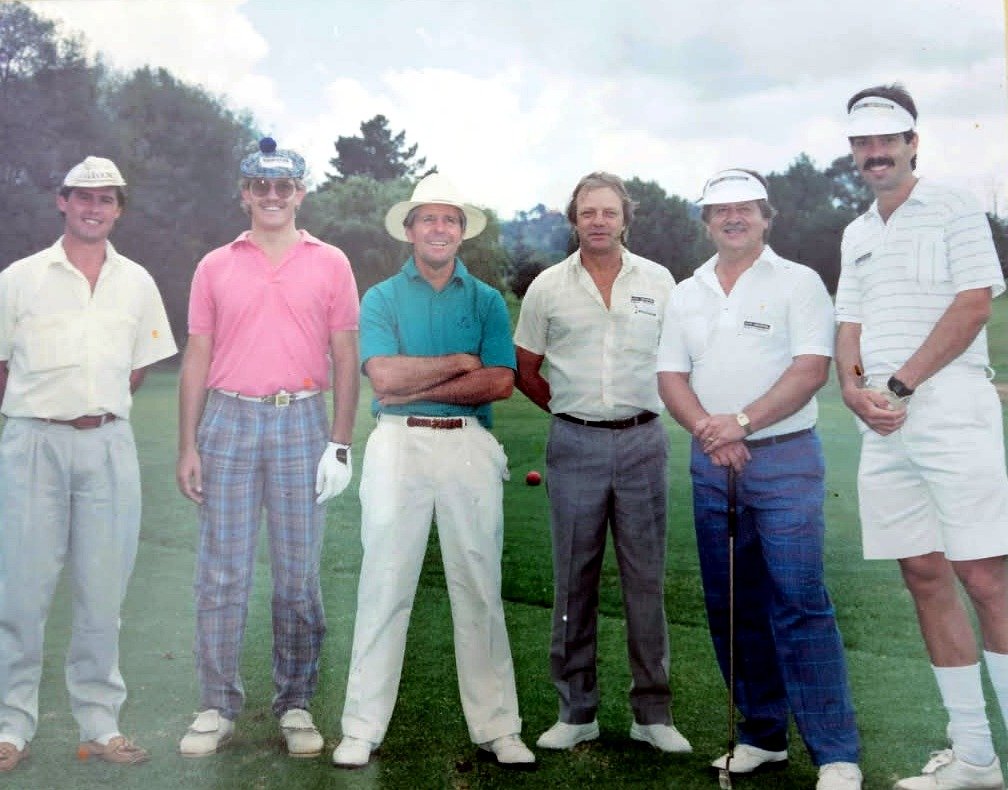 Gary Player, centre in the white hat, with Kobus Geldenhuis at far right — Auto & General Golf Day, 11 December 1991